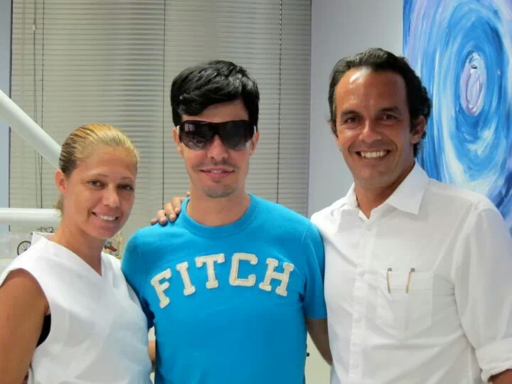 Dr. Marcelo Martins com paciente no atendimento particular