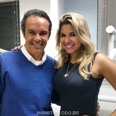 Dr. Marcelo Martins com paciente atleta